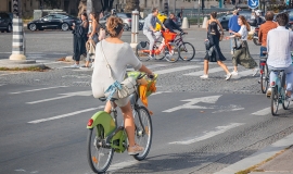 Cyclists of shared bikes on the Pont Alexandre III bridge, Paris © JeanLuclchard/Shutterstock.com